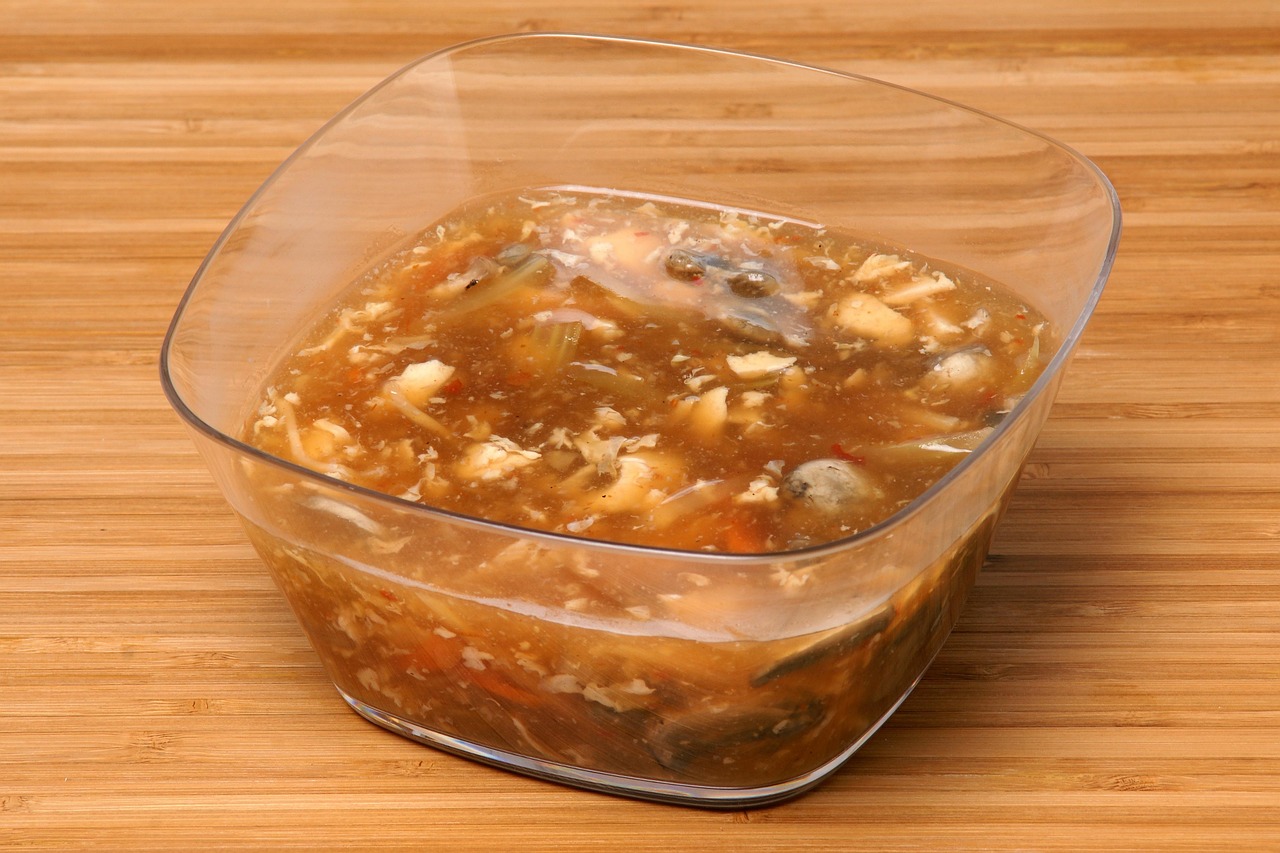 hot and sour soup in a plastic bowl