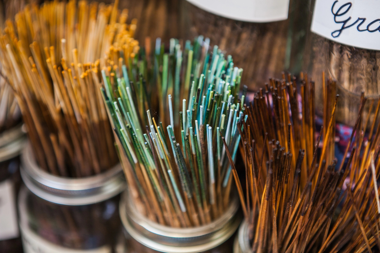 incense sticks in plastic jars
