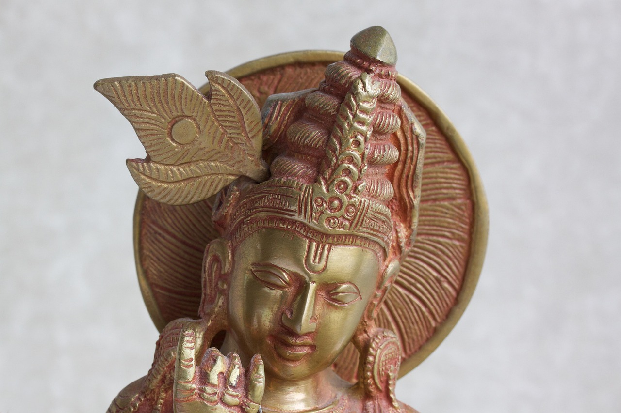 brass sculpture of lord krishna