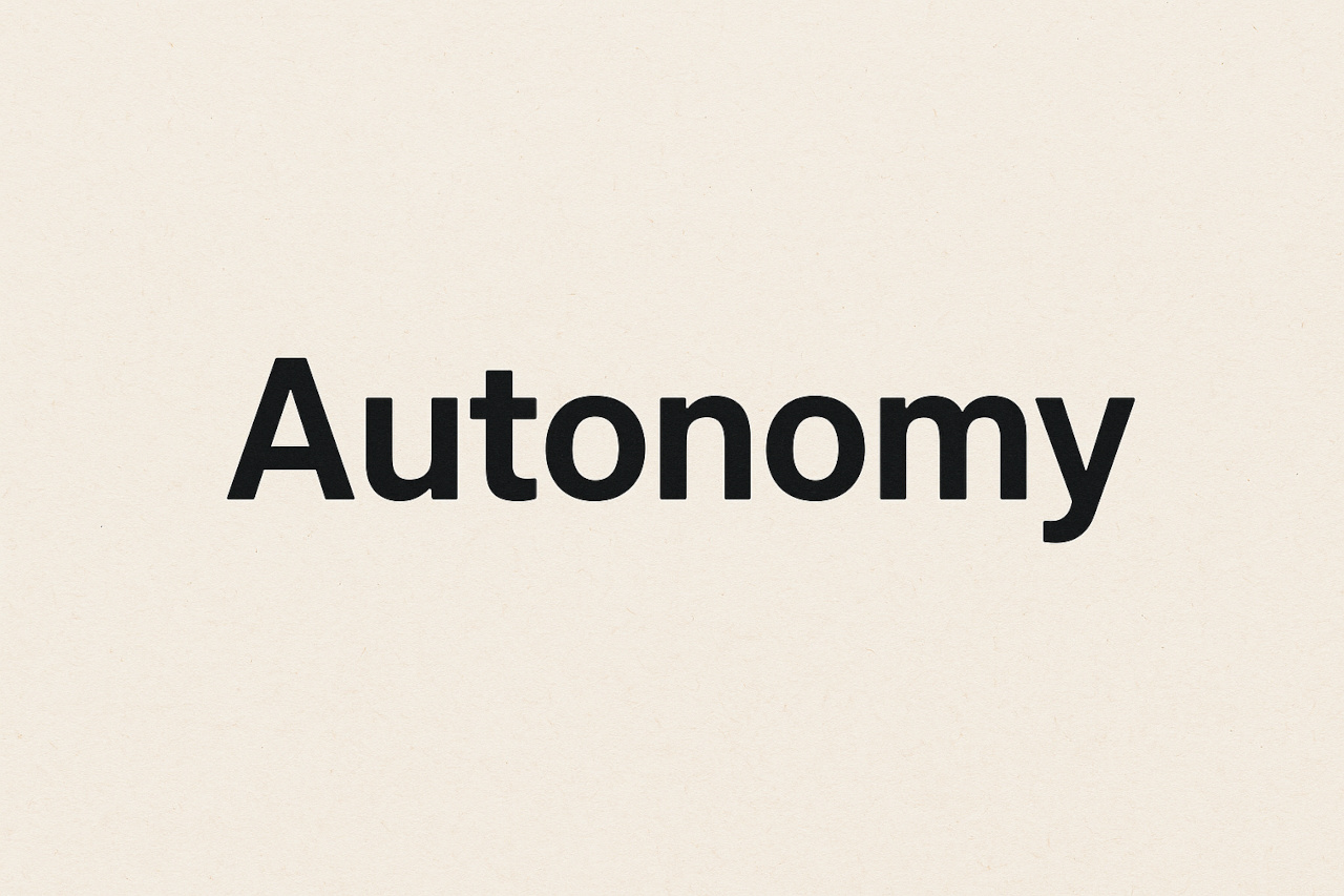 the word autonomy on a beige background