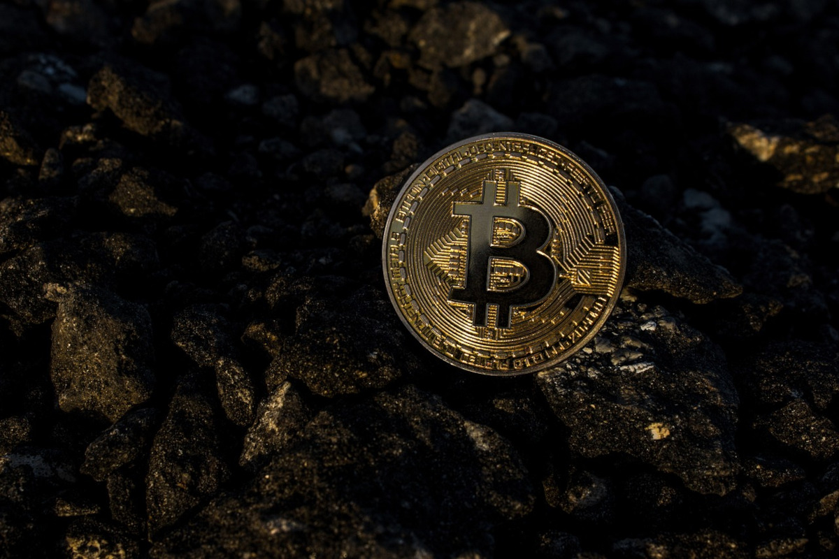 bitcoin cryptocurrency on textured black background