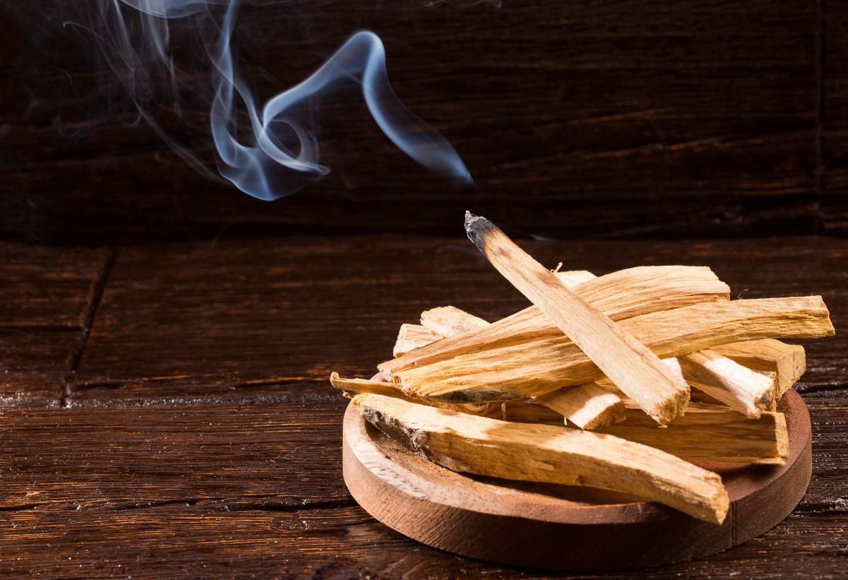 burning palo santo smudge sticks