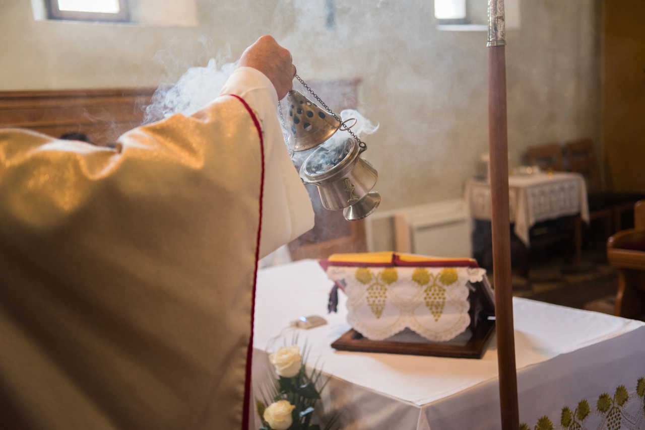incense being burned in a thurible during catholic mass