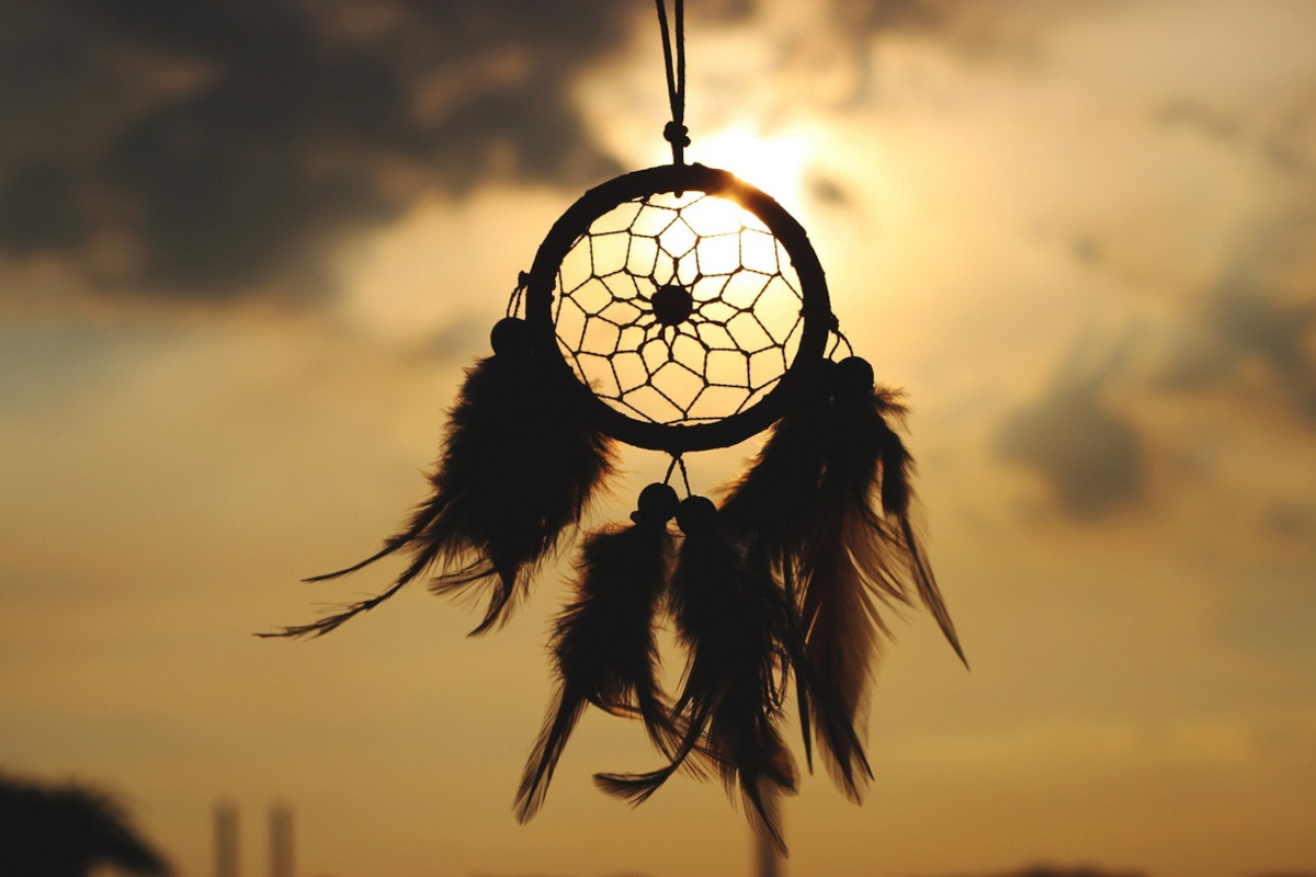 indian dream catcher in dim light