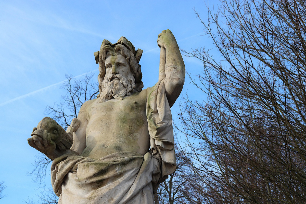 stone sculpture of zeus